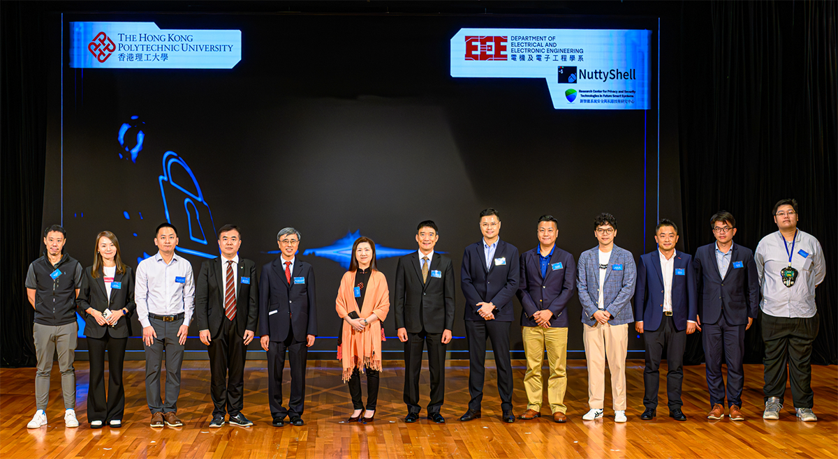 Ms Candy Chan, Assistant Commissioner (Project Governance and Cybersecurity) (6th left), Prof KY Wong (5th left), Prof Haibo Hu (4th left), Prof Francis Lau (7th right), and other speakers and guests in a group photo at “PolyU x NuttyShell Cybersecurity CTF 2025 Prize Presentation Ceremony”.