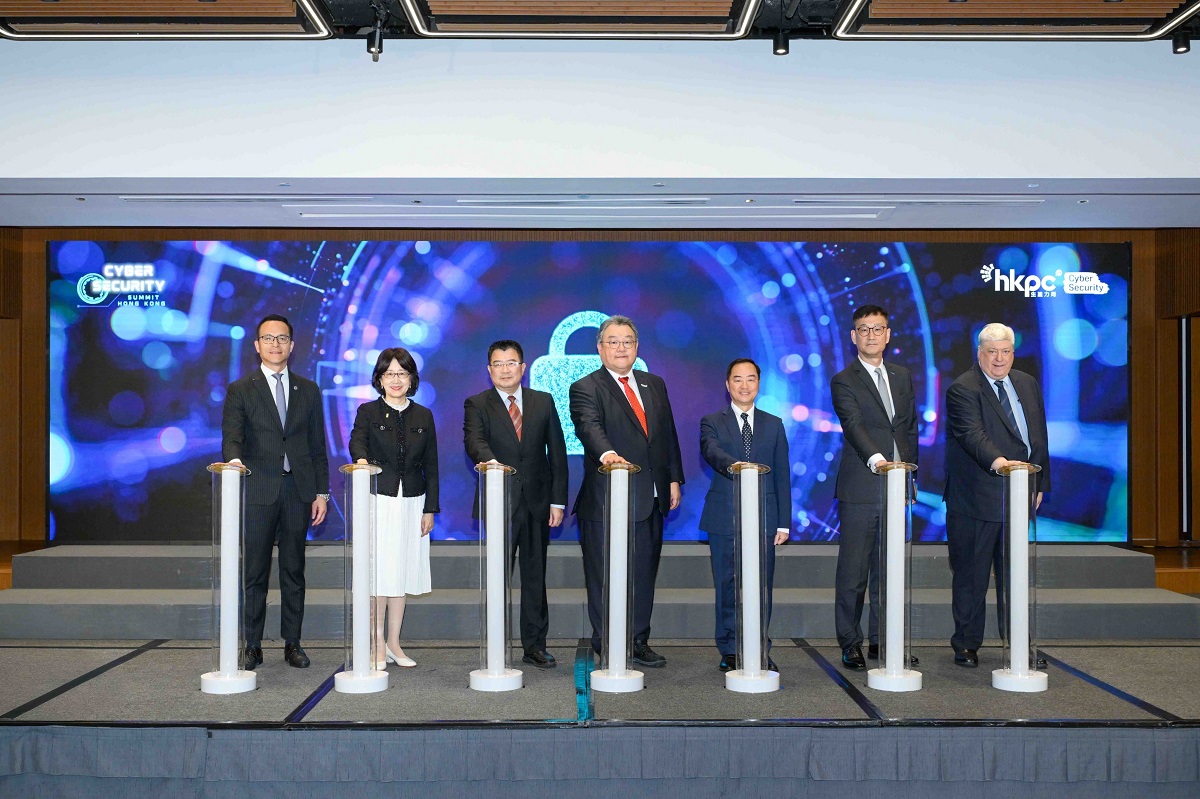 Ir Tony Wong, Commissioner for Digital Policy (third right), in group photo with Mr Zhou Wu Hu, Deputy Division Director-level Inspector of the Information Center, Liaison Office of the Central People's Government in Hong Kong (third left); Mr Emil Yu, Deputy Chairman, Hong Kong Productivity Council (fourth left); and other officiating guests at the “Cyber Security Summit Hong Kong 2025”.