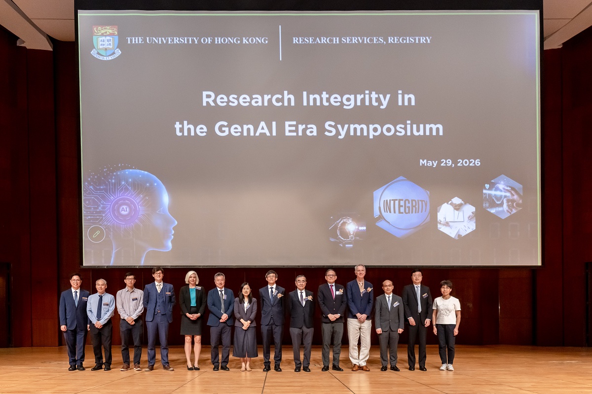 The Deputy Commissioner (Data Governance), Dr Ng Ping Chung (seventh right), in group photo with other guests at the “Research Integrity in the GenAI Era Symposium”.