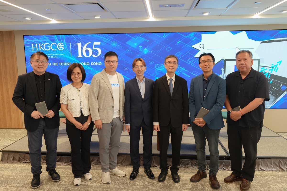 The Assistant Commissioner (Data Applications), Mr Brian Sun (third right), in group photo with guests. 