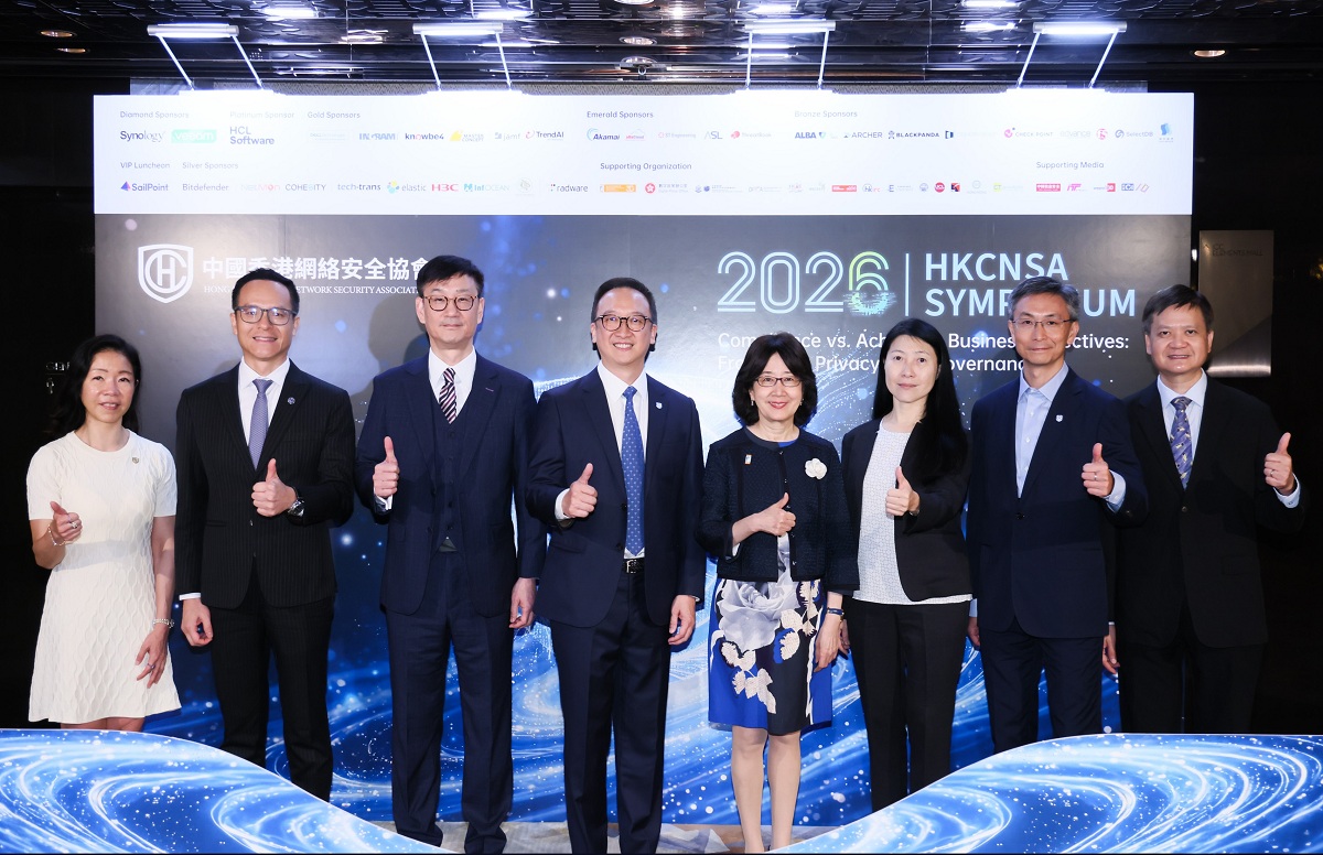 The Acting Deputy Commissioner (Digital Infrastructure), Ms Cari Wu (third right), in group photo with the Founding Chairman of the Hong Kong China Network Security Association, Mr David Ip (fourth left); Privacy Commissioner for Personal Data, Ms Ada Chung (fourth right); Commissioner of Critical Infrastructure (Computer-system Security), Mr Francis Chan (third left); Chief Superintendent of Police, Mr Raymond Lam (second left); Assistant Director (Regulatory) of the Office of the Communications Authority, Mr Sidney Tsan (first right) and other guests at the "Hong Kong China Network Security Association Symposium 2026".