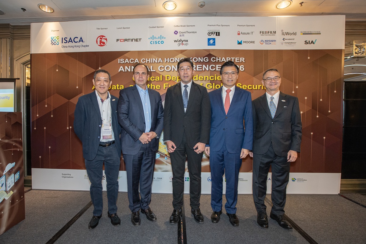The Acting Commissioner for Digital Policy, Mr Daniel Cheung (middle), in group photo with Legislative Council Member, Hon Duncan Chiu (second right), CEO of ISACA, Mr Erik Prusch (second left), President of ISACA China Hong Kong Chapter, Dr Welland Chu (first right) and Immediate Past President of ISACA China Hong Kong Chapter, Mr Eugene Ha (first left), at the “ISACA China Hong Kong Chapter Annual Conference 2026”.